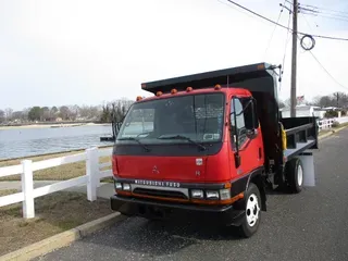 2002 MITSUBISHI FE 125