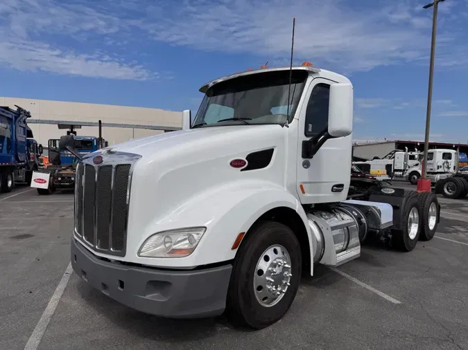 2021 Peterbilt 57929e37ebc6bc41ad53bca49c05b61d06a
