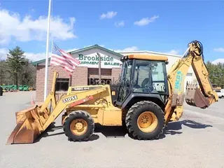 1997 DEERE 310SE