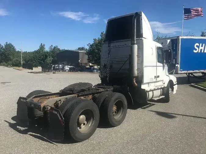 2003 VOLVO VNL64430