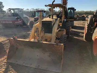 2002 Deere 210LE