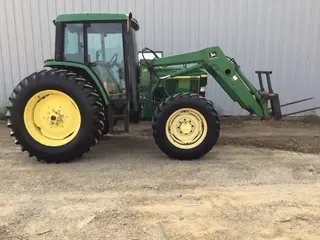 2001 JOHN DEERE 6410